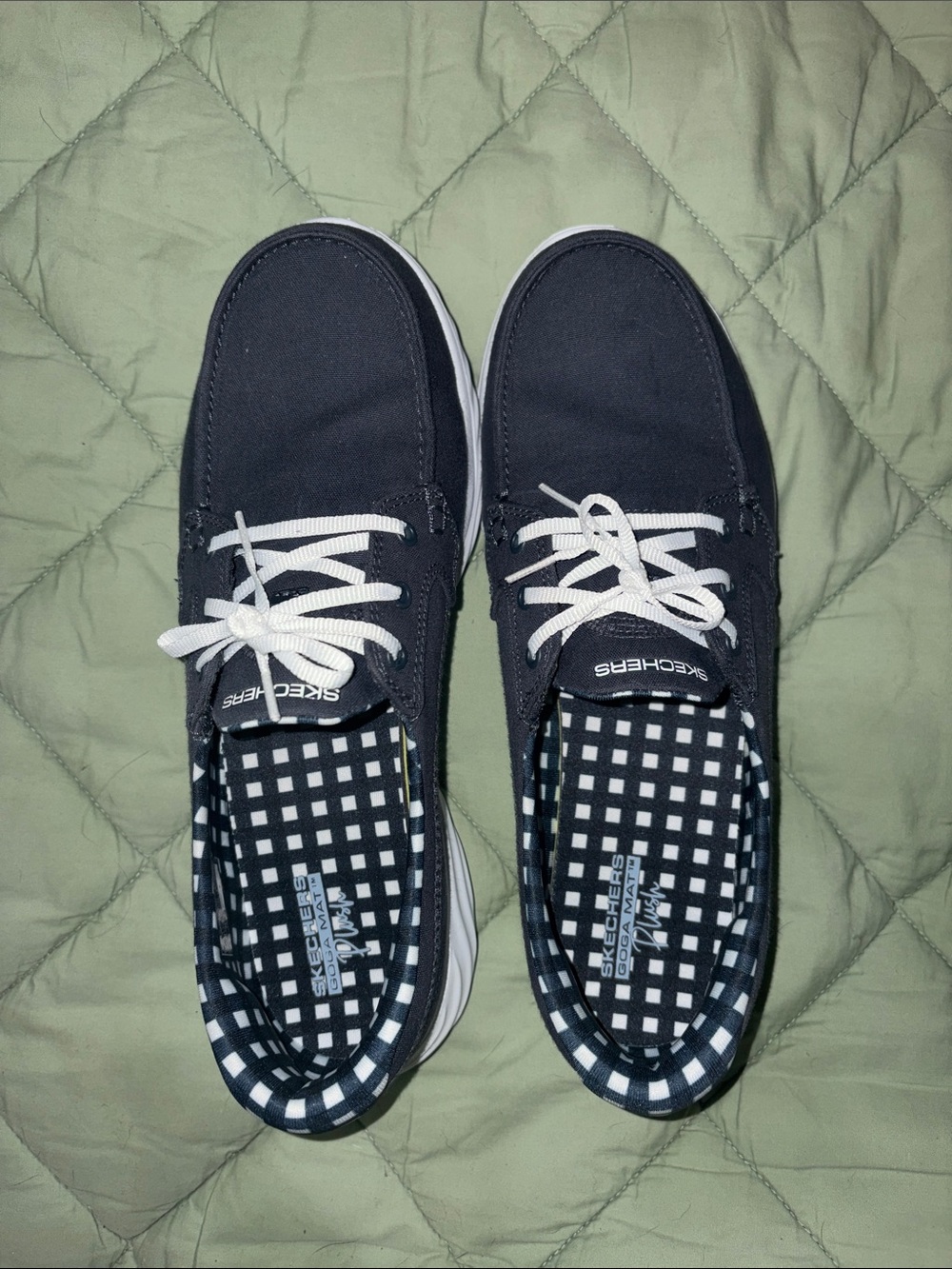 Skechers women’s navy blue Canvas Boat Shoes with White Laces